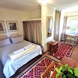 E: Kuti en-suite room with double bed and valley view_3