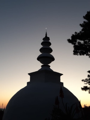new moon over the stupa